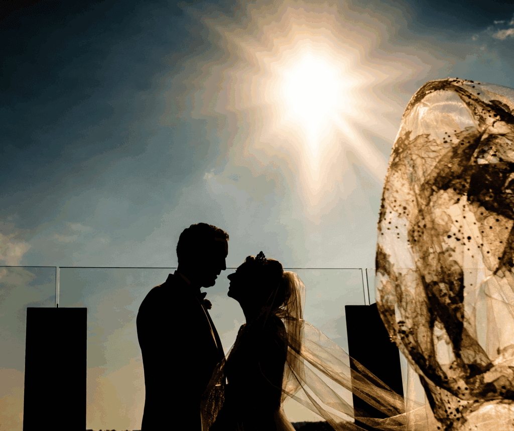 A couple on their wedding day as the sun begins to set. This image shows the beauty of Ohio weddings.